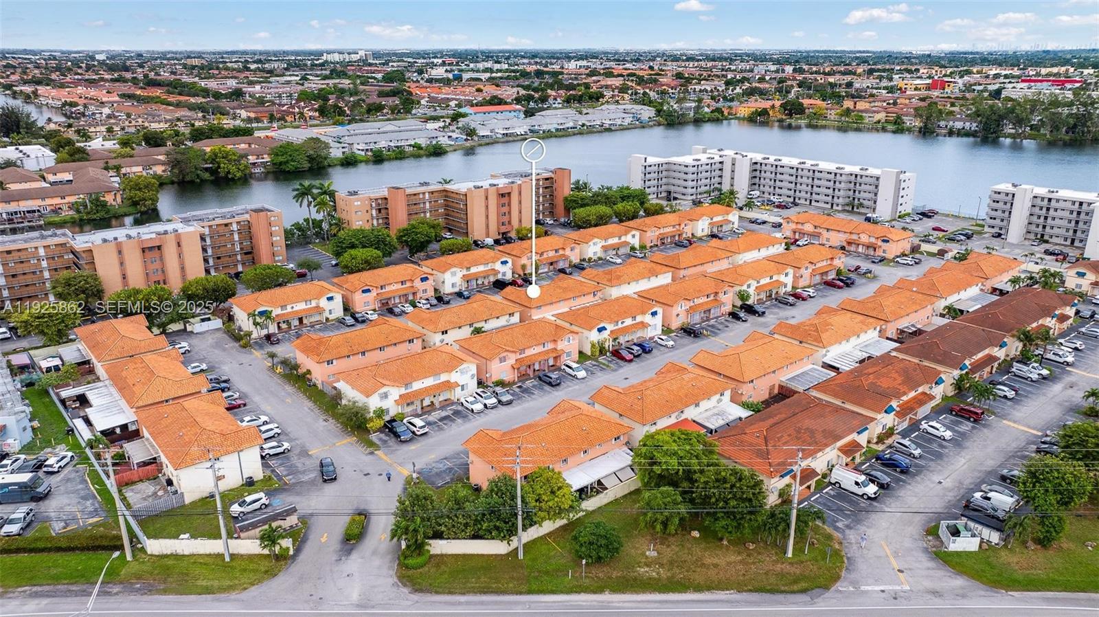 10101 West Okeechobee Road, Unit 13202 Hialeah Gardens, FL 33016 - Photo 11 of 30 an aerial view of tennis court