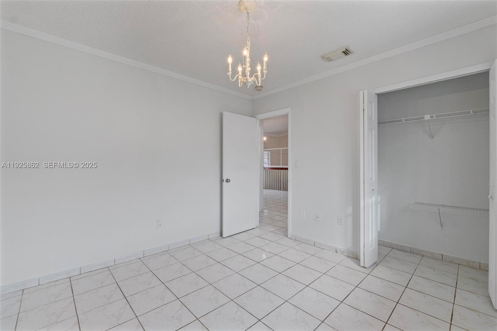 10101 West Okeechobee Road, Unit 13202 Hialeah Gardens, FL 33016 - Photo 24 of 30 a view of an empty room