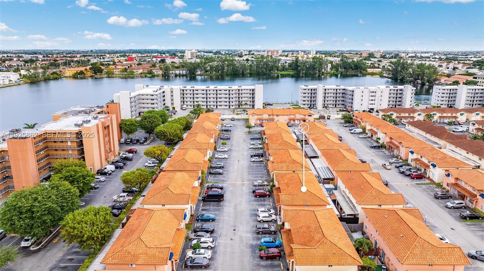 10101 West Okeechobee Road, Unit 13202 Hialeah Gardens, FL 33016 - Photo 6 of 30 aerial view of a lake