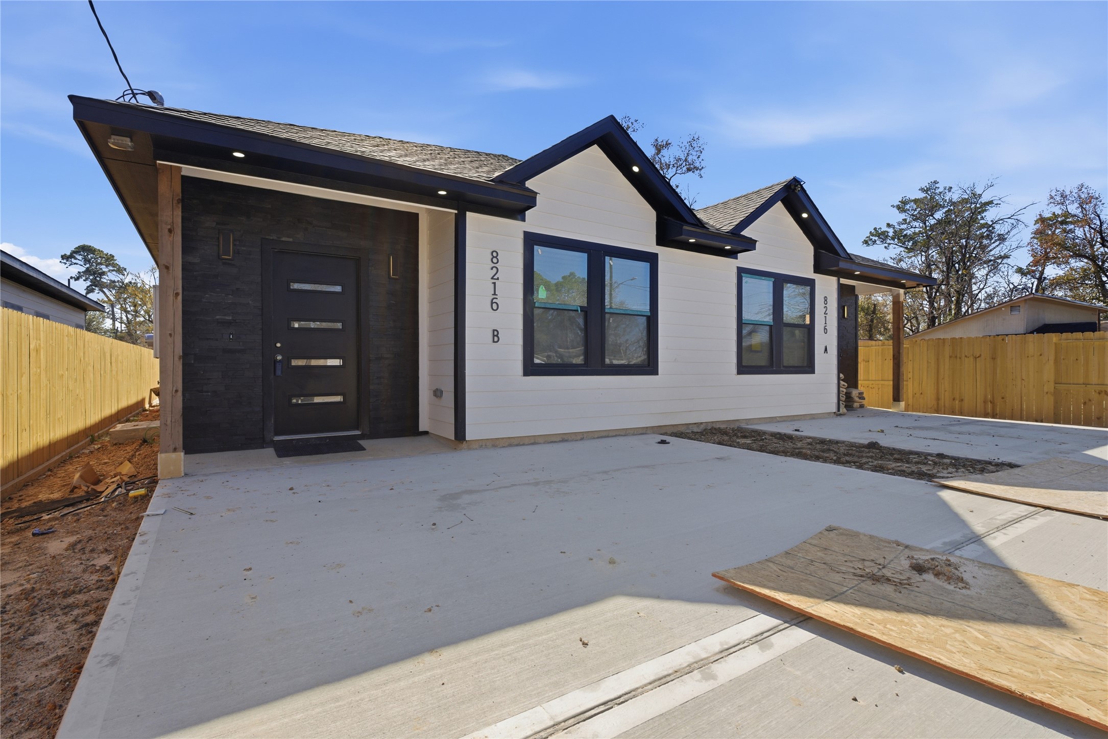 a view of a house with a garage