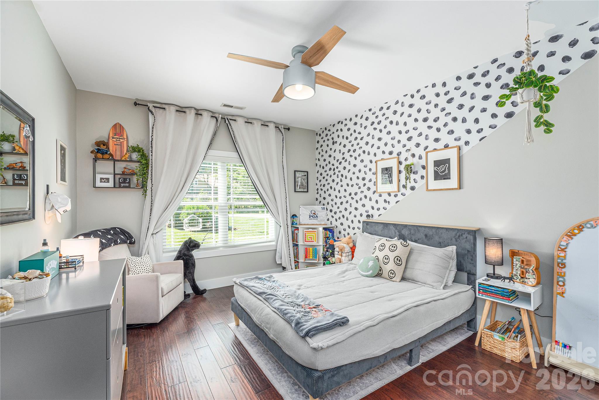 348 Olivet Lane Fletcher, NC 28732 - Photo 25 of 39 a bedroom with a bed and a window