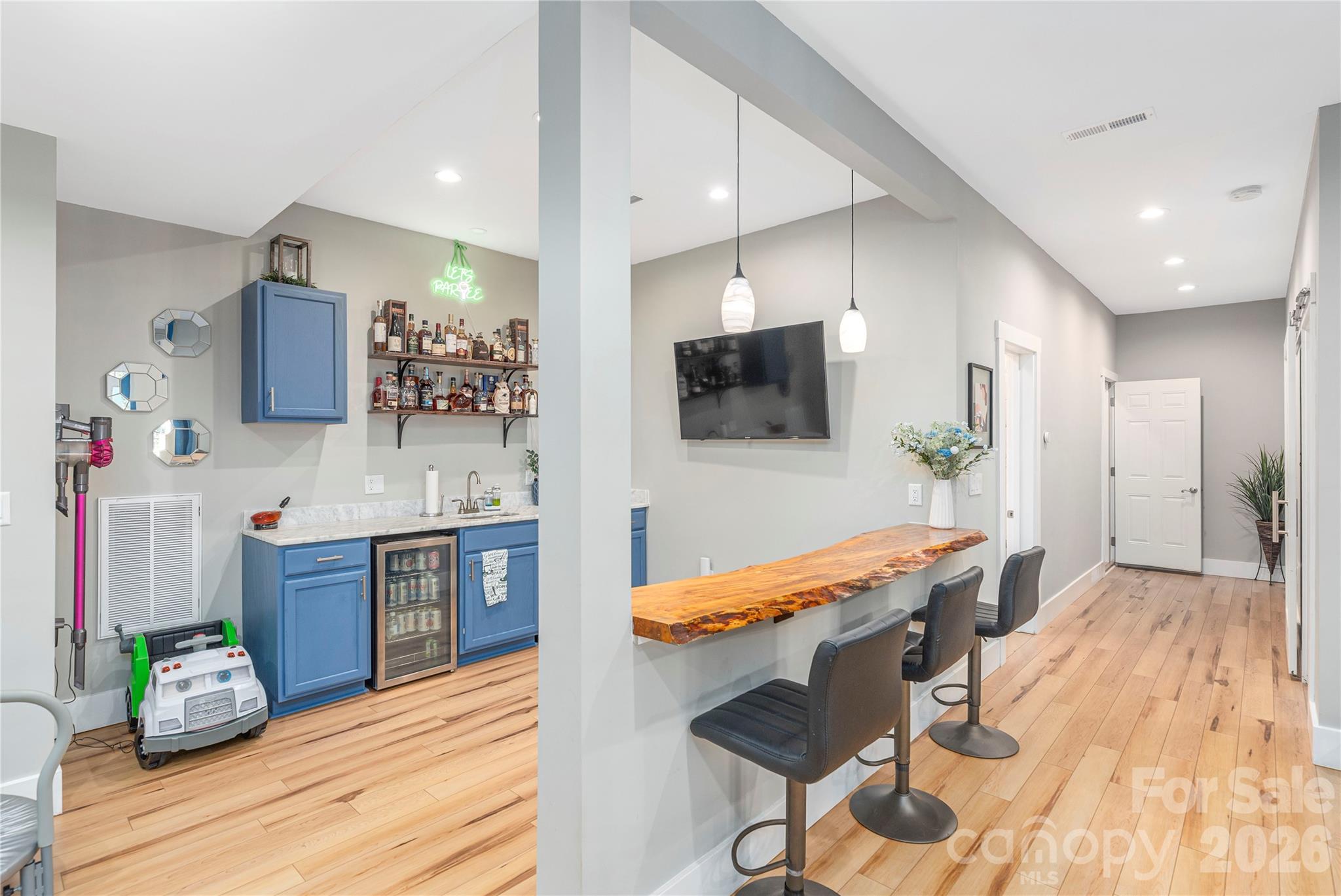 348 Olivet Lane Fletcher, NC 28732 - Photo 28 of 39 a living room with furniture and a flat screen tv