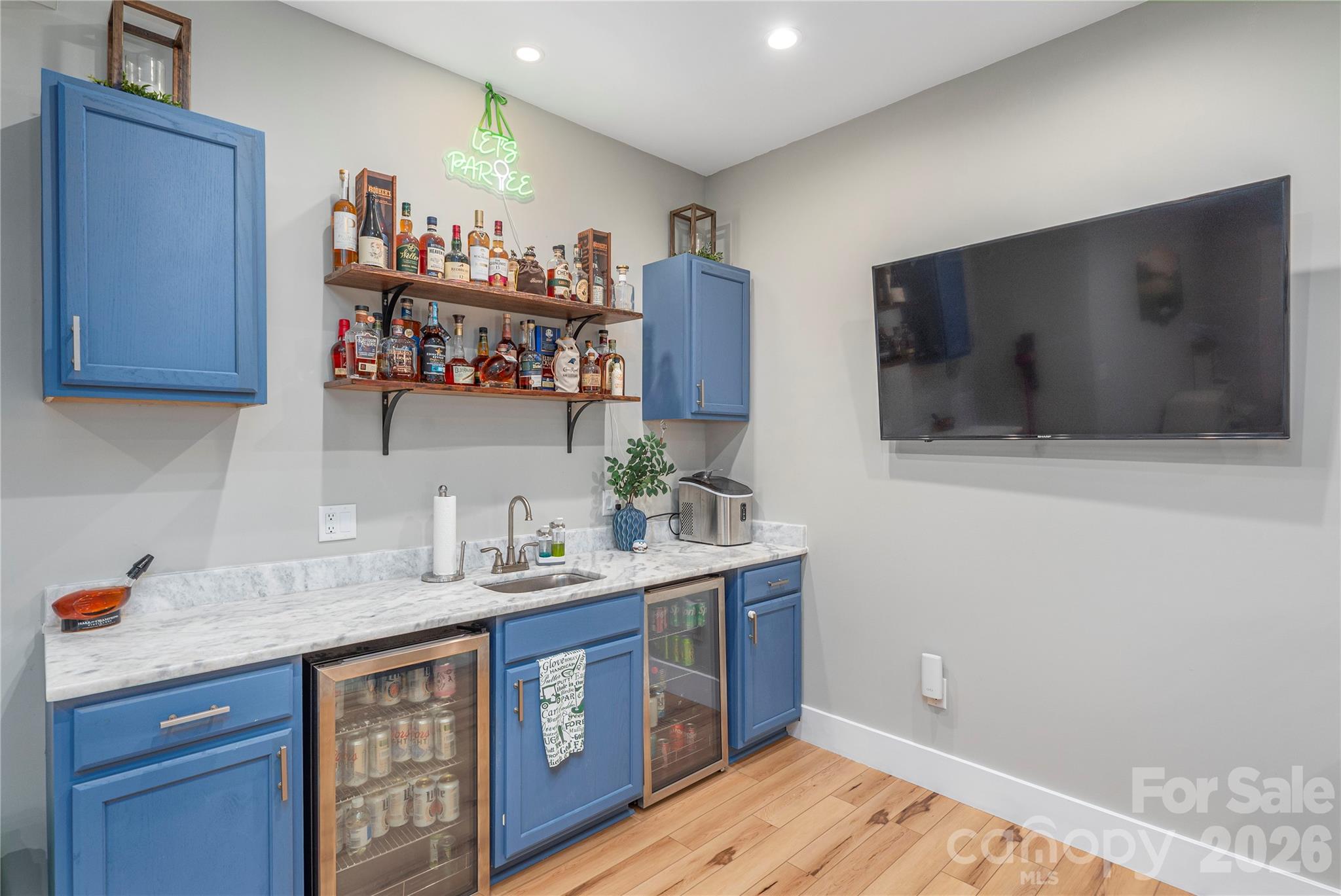 348 Olivet Lane Fletcher, NC 28732 - Photo 31 of 39 a kitchen with stainless steel appliances wooden cabinets and a sink