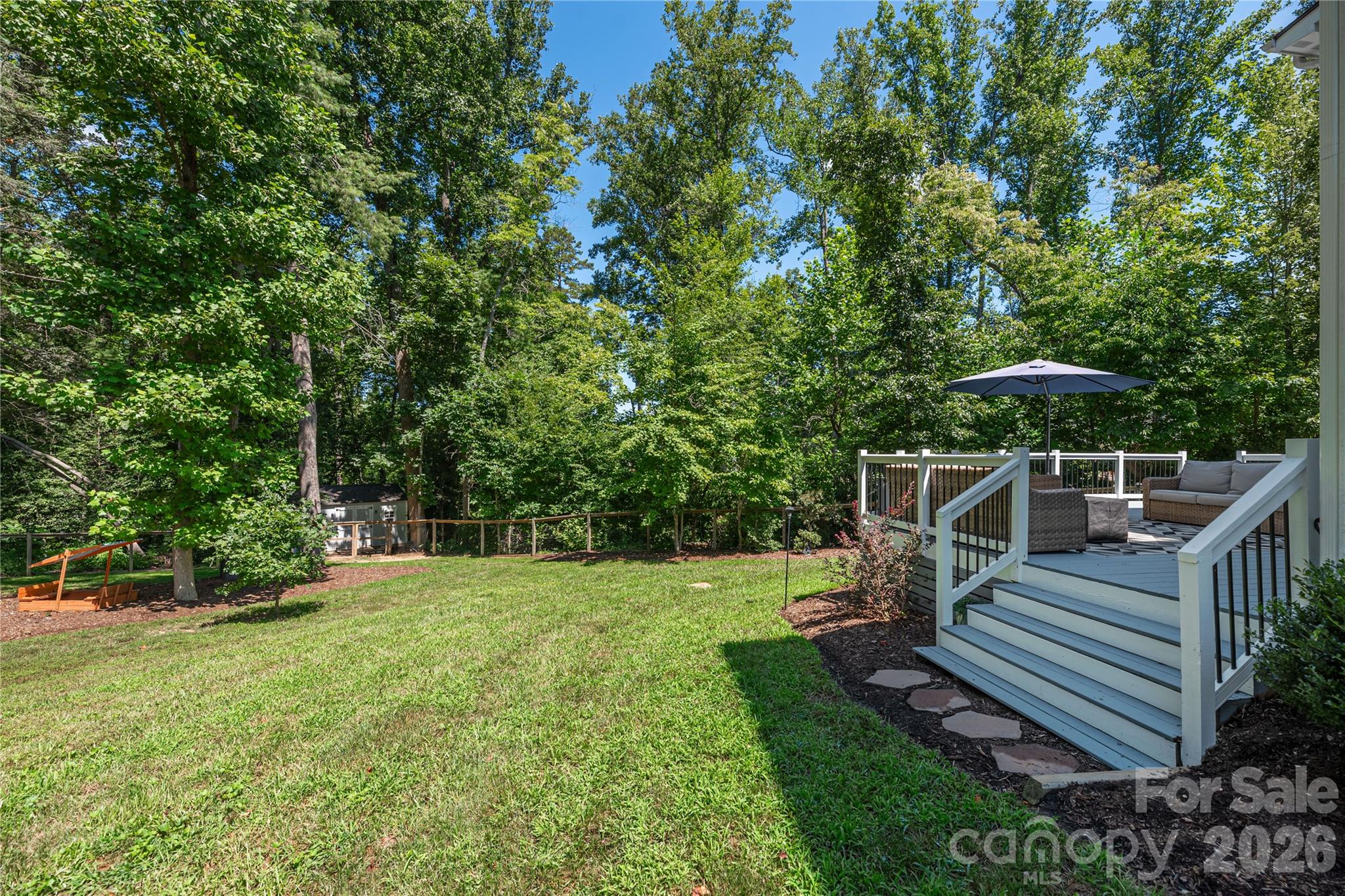 348 Olivet Lane Fletcher, NC 28732 - Photo 36 of 39 a view of a house with backyard and sitting area