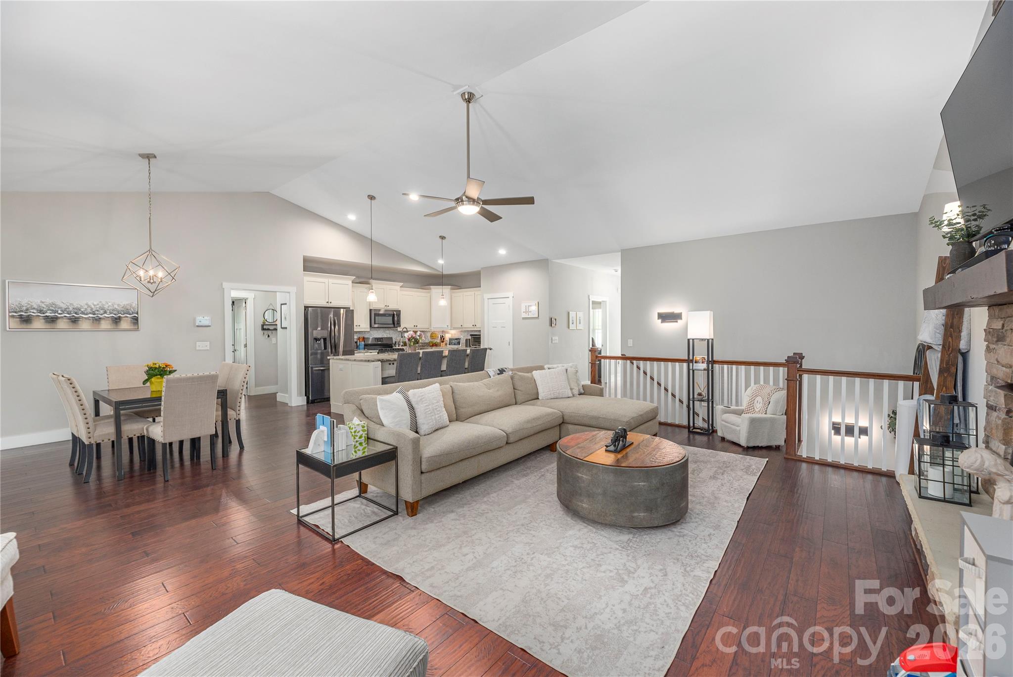 348 Olivet Lane Fletcher, NC 28732 - Photo 7 of 39 a living room with lots of furniture and a chandelier