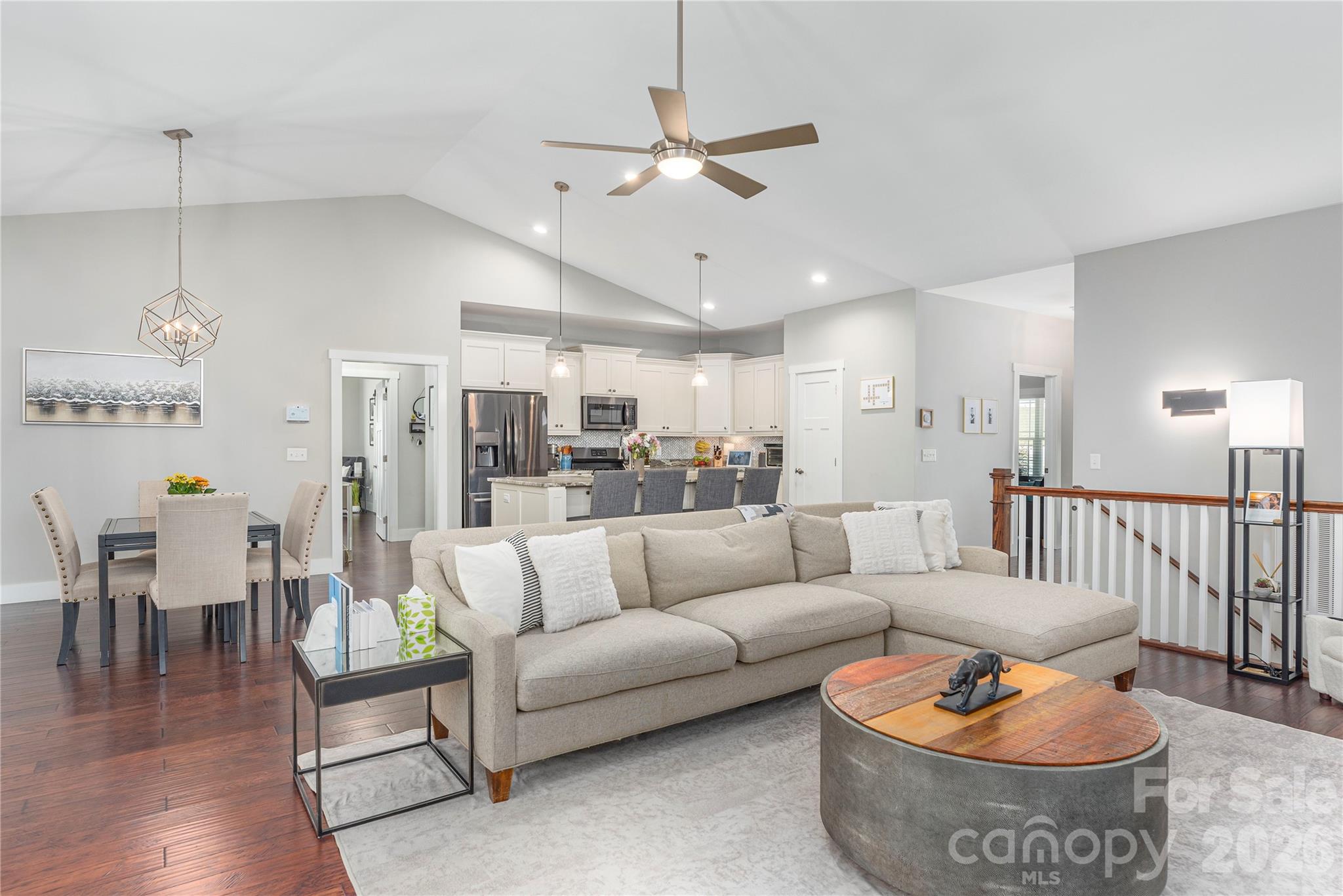 348 Olivet Lane Fletcher, NC 28732 - Photo 8 of 39 a living room with furniture and a chandelier