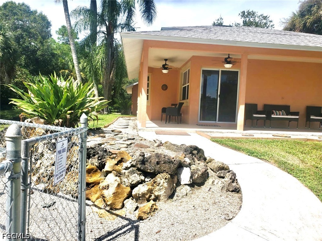 740 19th Street Southwest Naples, FL 34117 - Photo 8 of 35 a view of swimming pool with a patio
