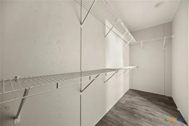 a view of a room with racks on the wall