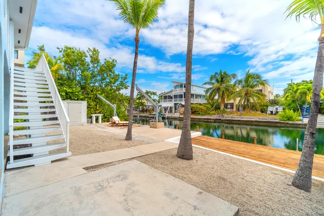 a view of a lake with a house