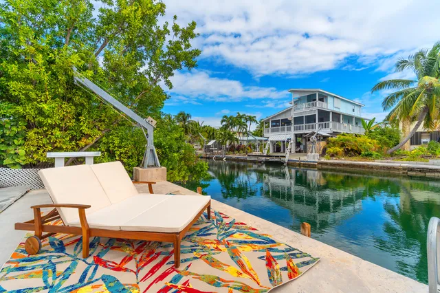 a view of swimming pool with patio