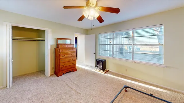 a room with furniture and a window