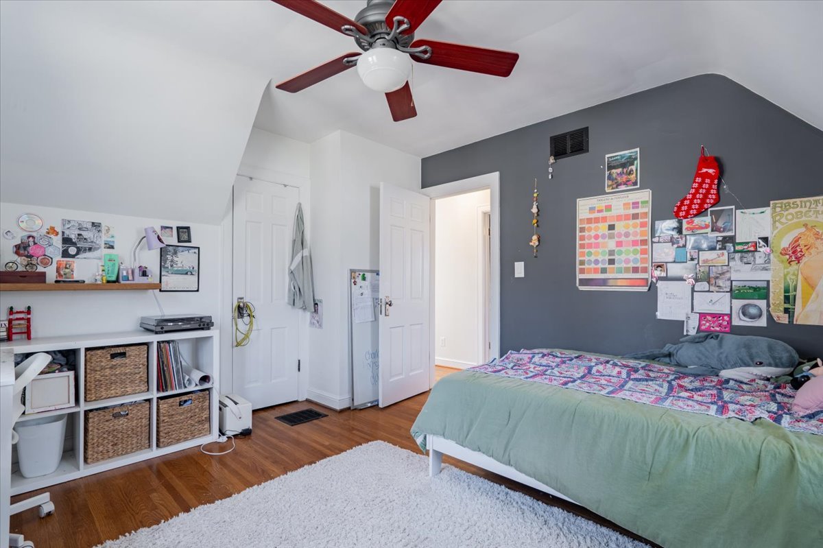413 Grant Street Normal, IL 61761 - Photo 20 of 40 a bedroom with a bed and cabinets
