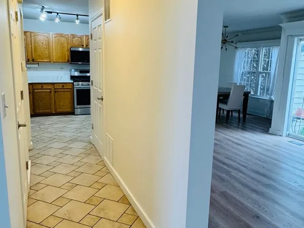 a view of a kitchen from the hallway