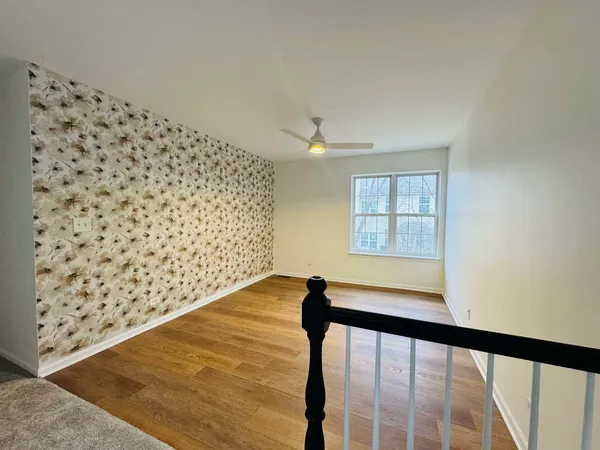 a view of a balcony and a window