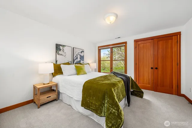 a bathroom with a sink double vanity and a mirror