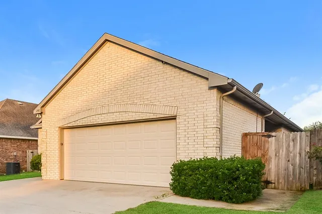 a view of a house with a garage