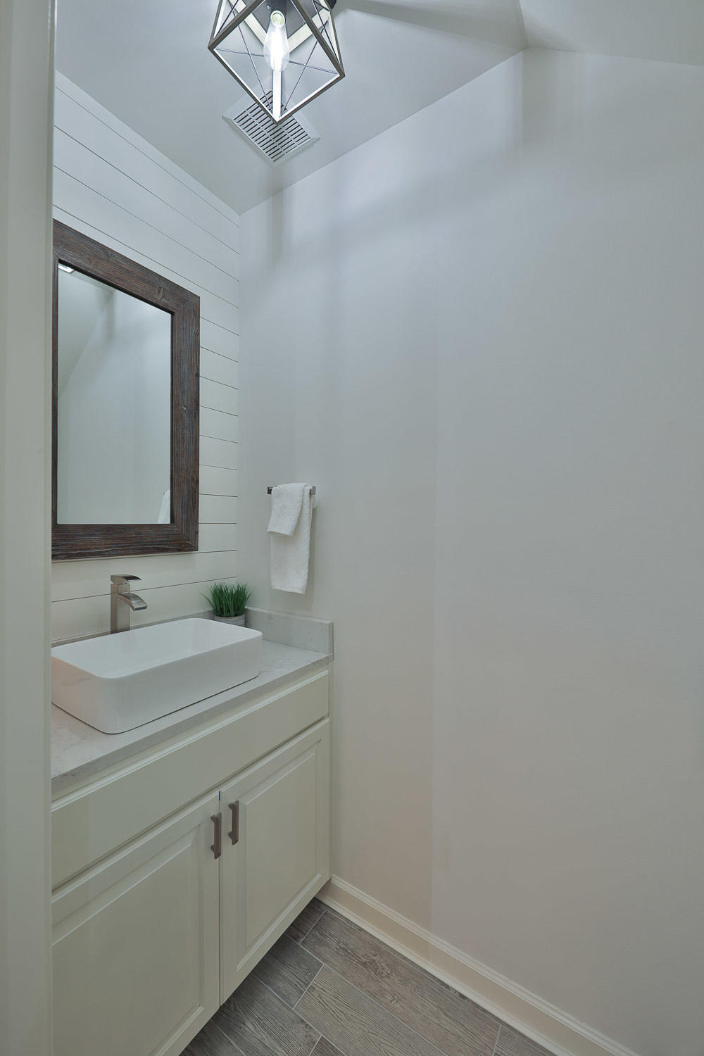 222 South Zander Way Santa Rosa Beach, FL 32459 - Photo 11 of 31 a bathroom with a sink and a mirror