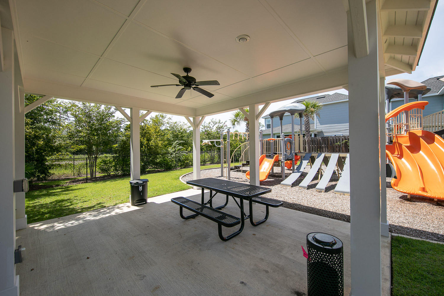 222 South Zander Way Santa Rosa Beach, FL 32459 - Photo 28 of 31 a view of a porch with furniture and garden