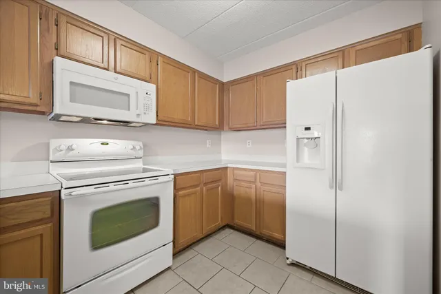 $275,000 | 7317 Eden Brook Drive, Unit H305, Columbia, MD 21046