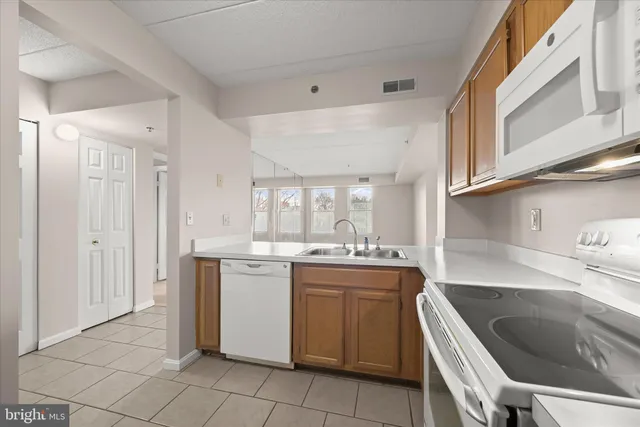 $275,000 | 7317 Eden Brook Drive, Unit H305, Columbia, MD 21046