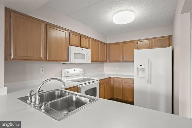 $275,000 | 7317 Eden Brook Drive, Unit H305, Columbia, MD 21046