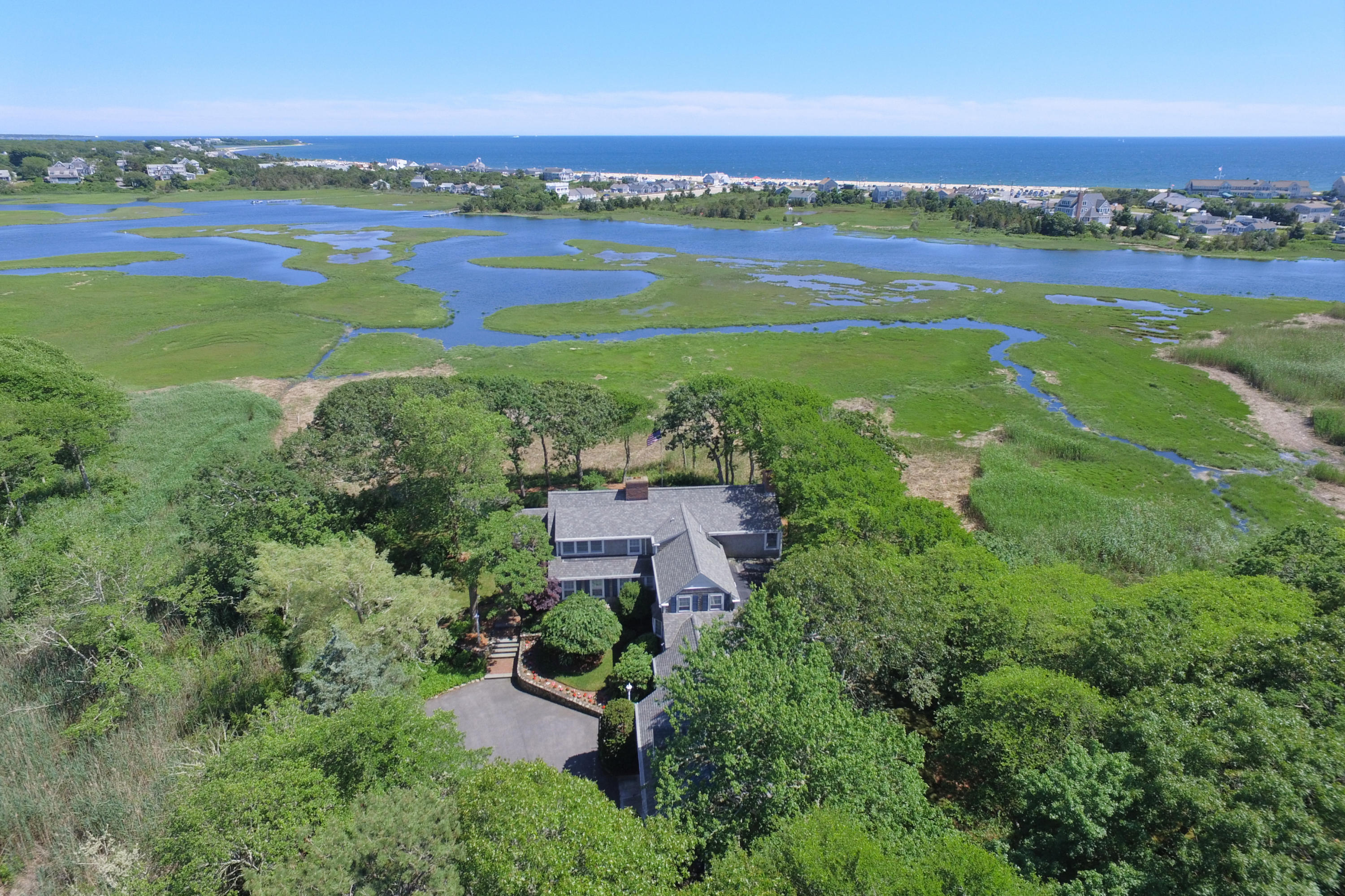 21 Waterman Farm Road Centerville, MA 02632 - Photo 1 of 22 a view of city and ocean