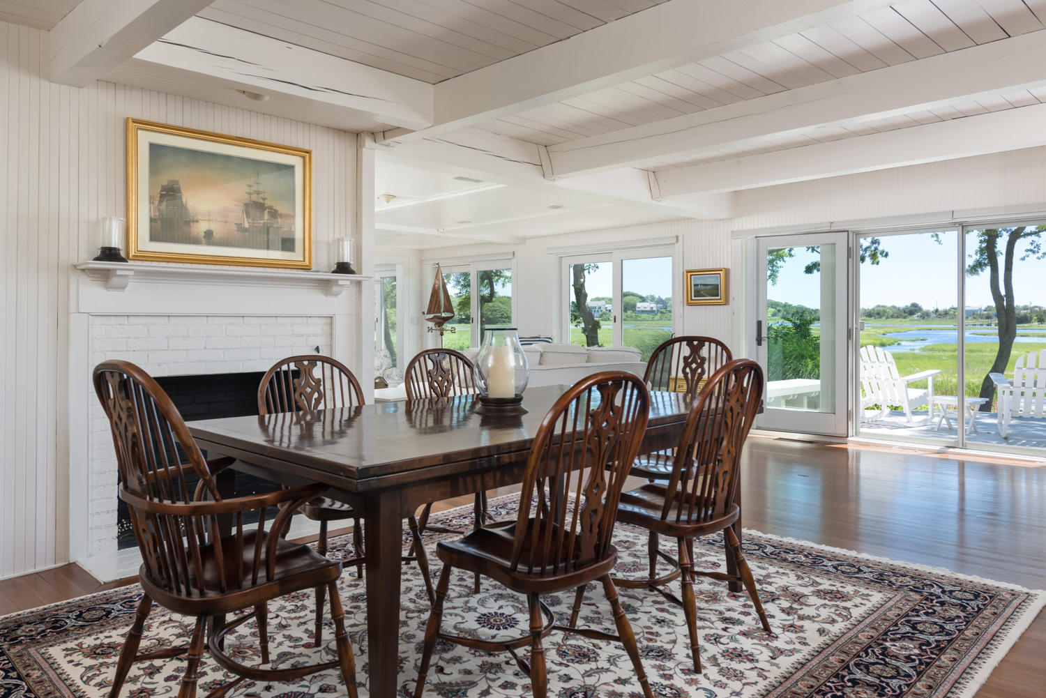 21 Waterman Farm Road Centerville, MA 02632 - Photo 8 of 22 a view of a dining room with furniture window and wooden floor