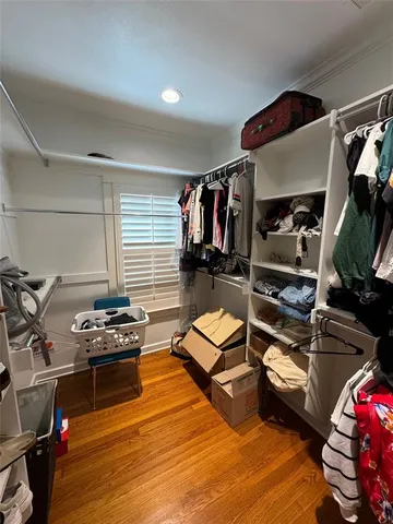 a room with furniture and gym equipment