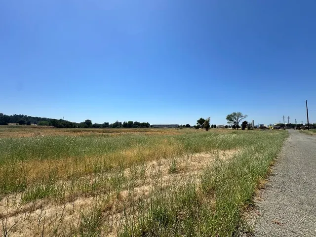 a view of lake with green space