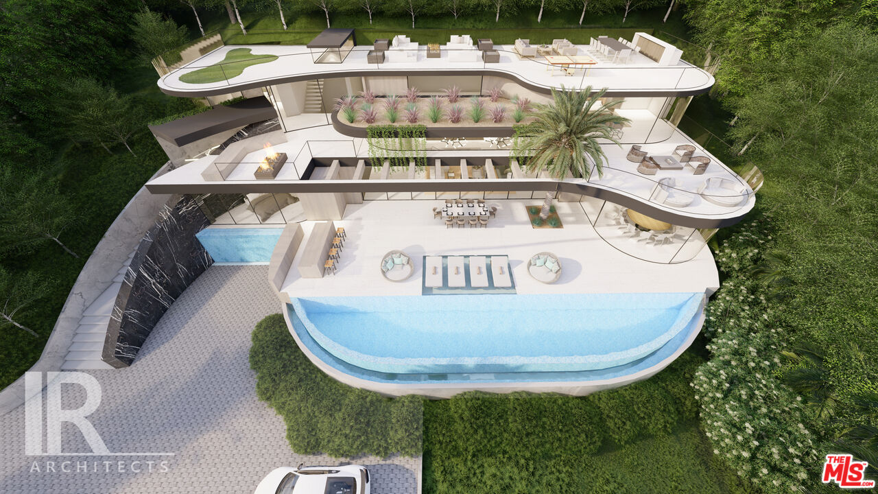 22411 Pacific Coast Highway Malibu, CA 90265 - Photo 2 of 5 a view of a chairs in a backyard