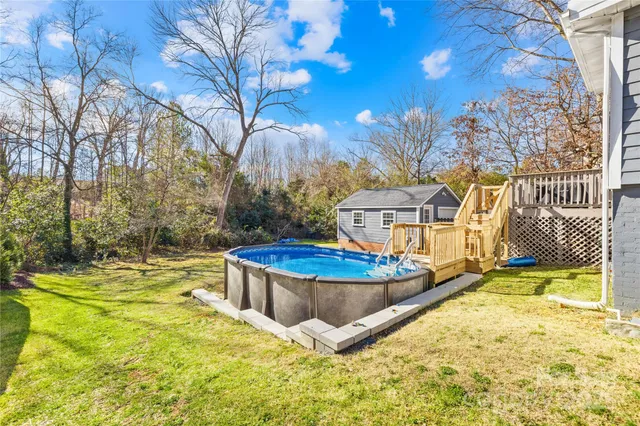 a view of a swimming pool with an outdoor space