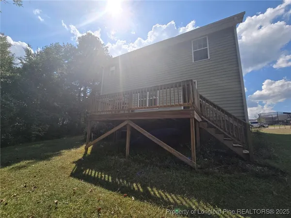 a view of empty room with windows