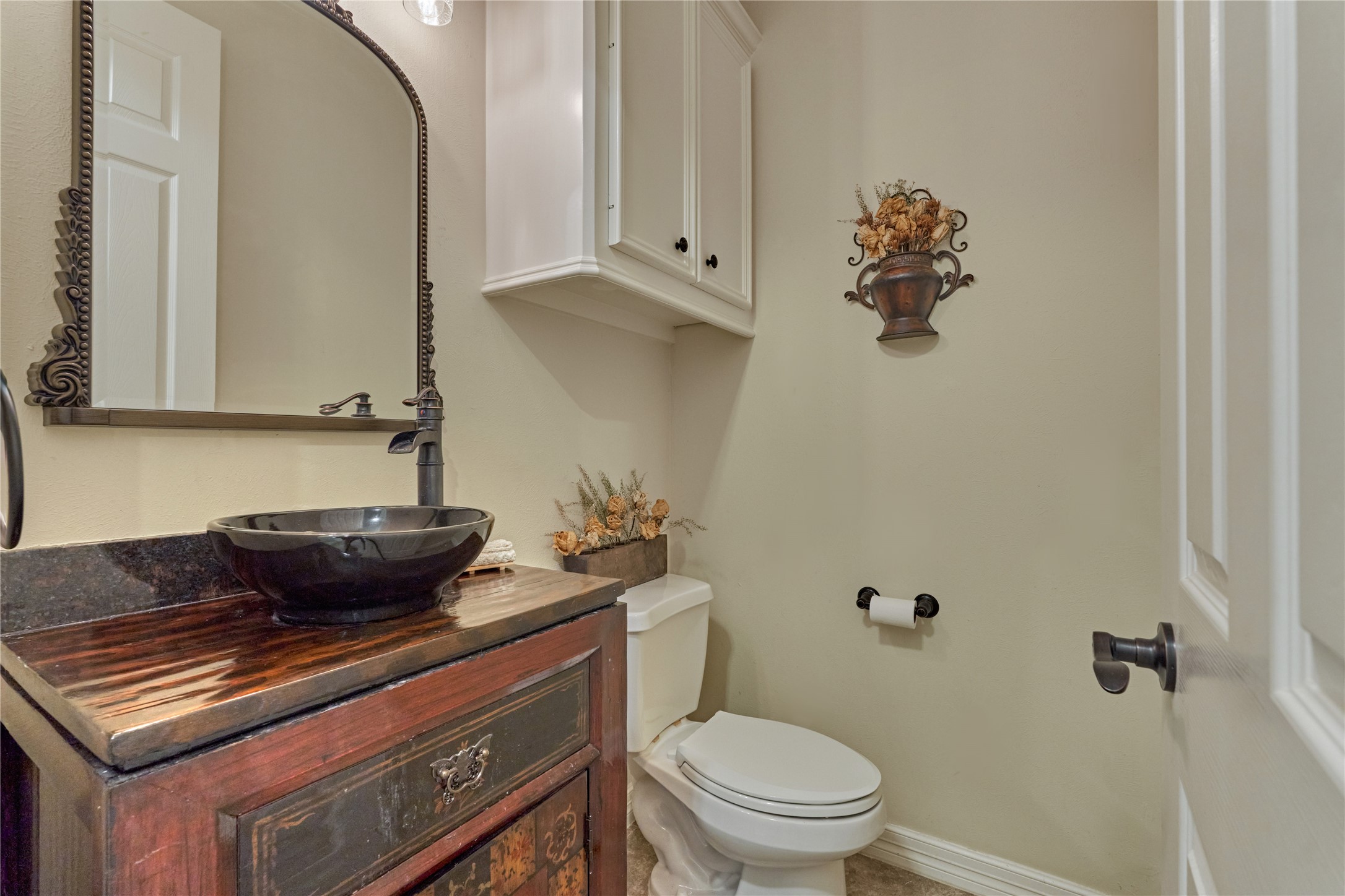 203 Monterrey Road East Montgomery, TX 77356 - Photo 21 of 50 The half bath features a new vanity, mirror and lighting.