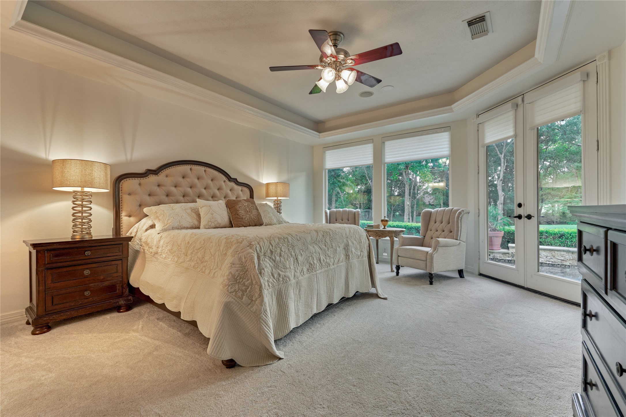 203 Monterrey Road East Montgomery, TX 77356 - Photo 23 of 50 The owner's retreat serves as a private sanctuary with serene views of the sparkling pool and fairway.