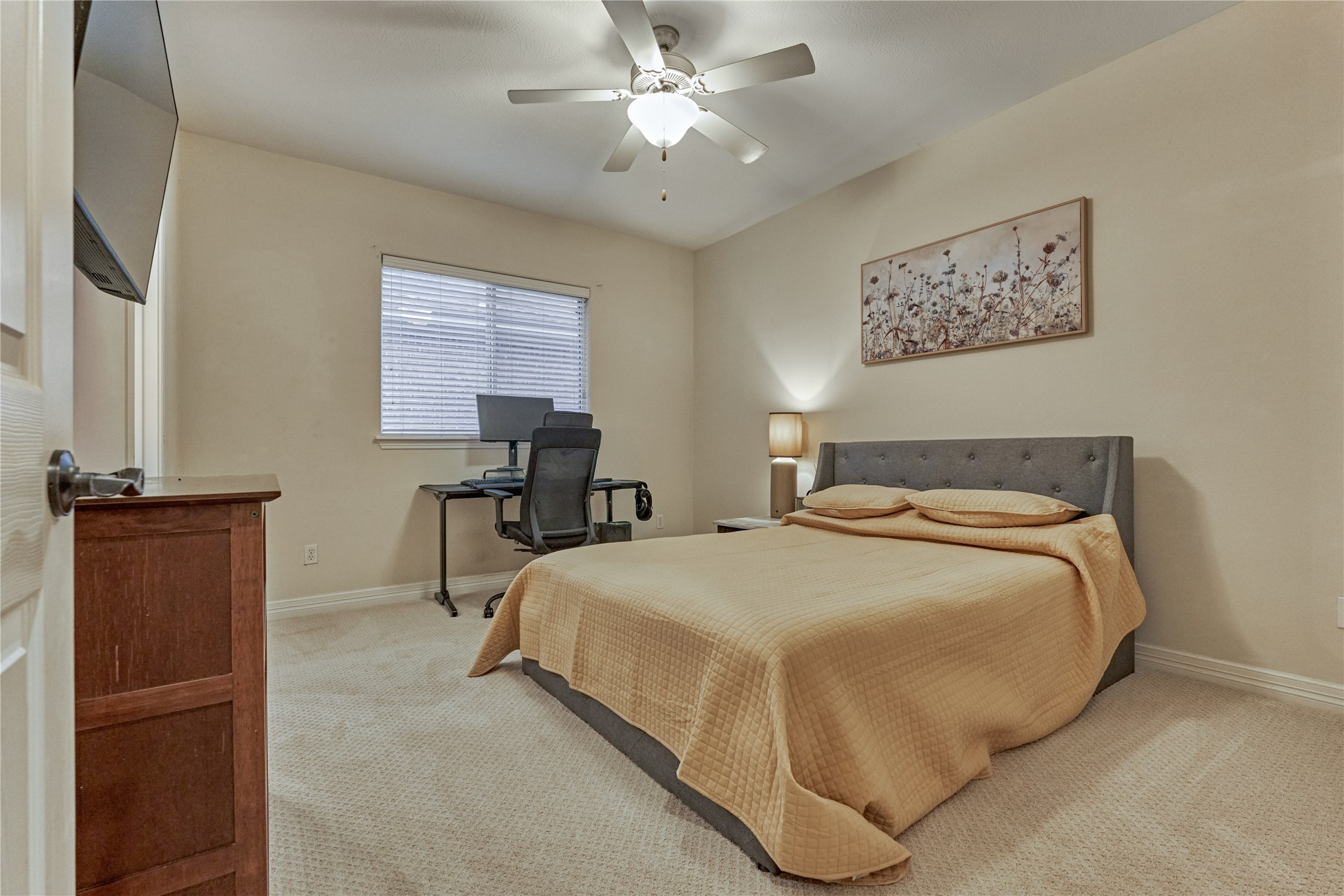 203 Monterrey Road East Montgomery, TX 77356 - Photo 29 of 50 Secondary bedroom #1 on the first floor features new carpet, high ceilings and it's own private ensuite bath.