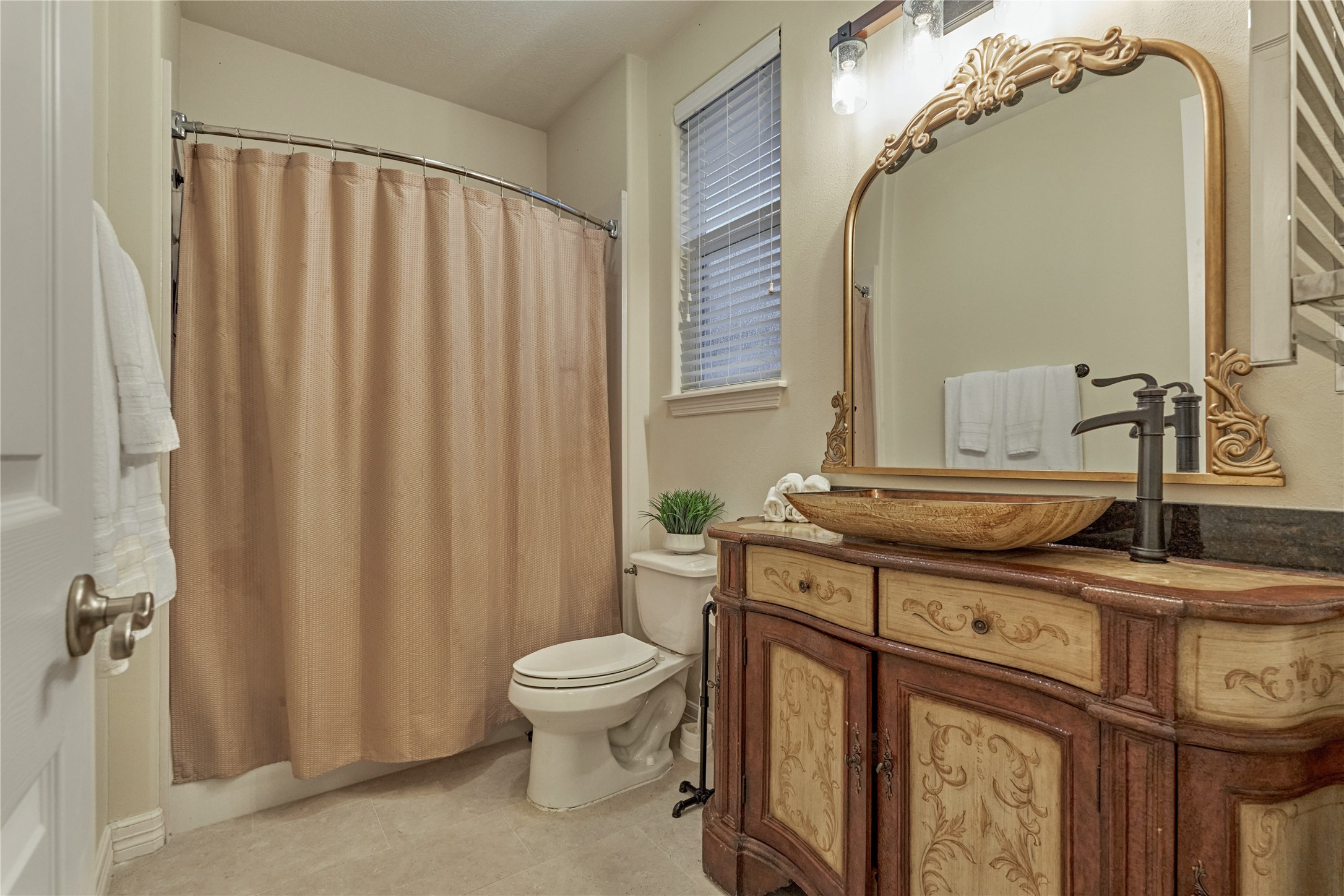 203 Monterrey Road East Montgomery, TX 77356 - Photo 30 of 50 Completely updated ensuite bath for downstairs secondary bedroom.