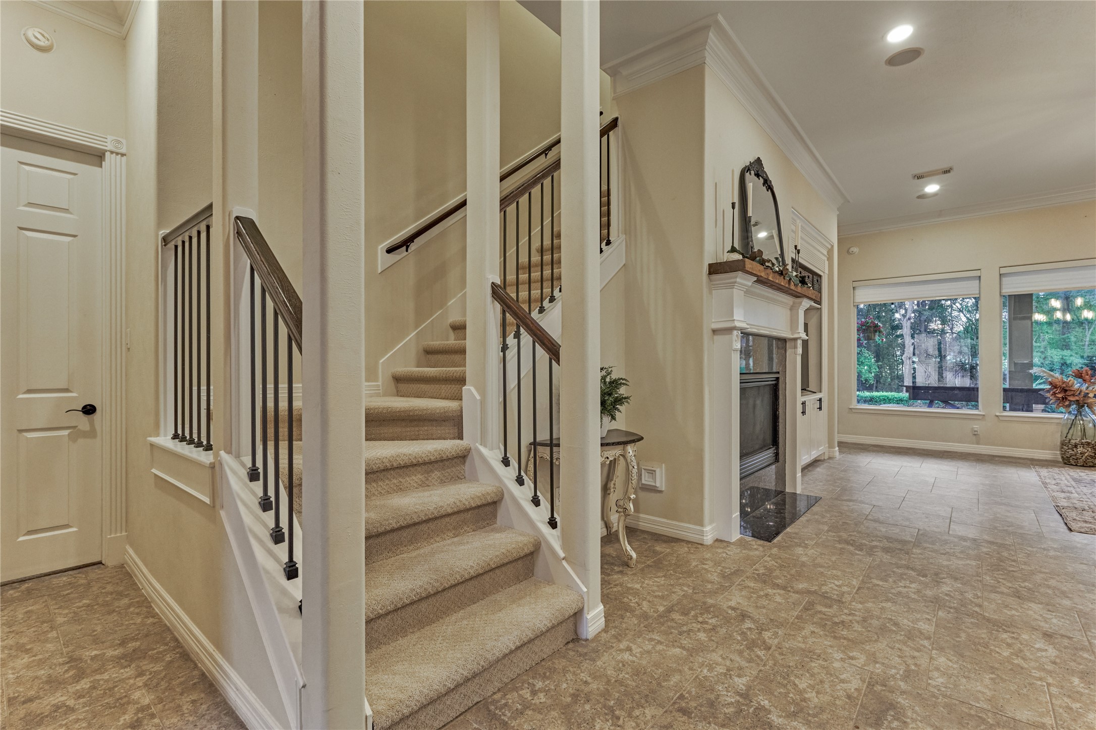 203 Monterrey Road East Montgomery, TX 77356 - Photo 31 of 50 The striking staircase features new wrought iron railing and new carpet.