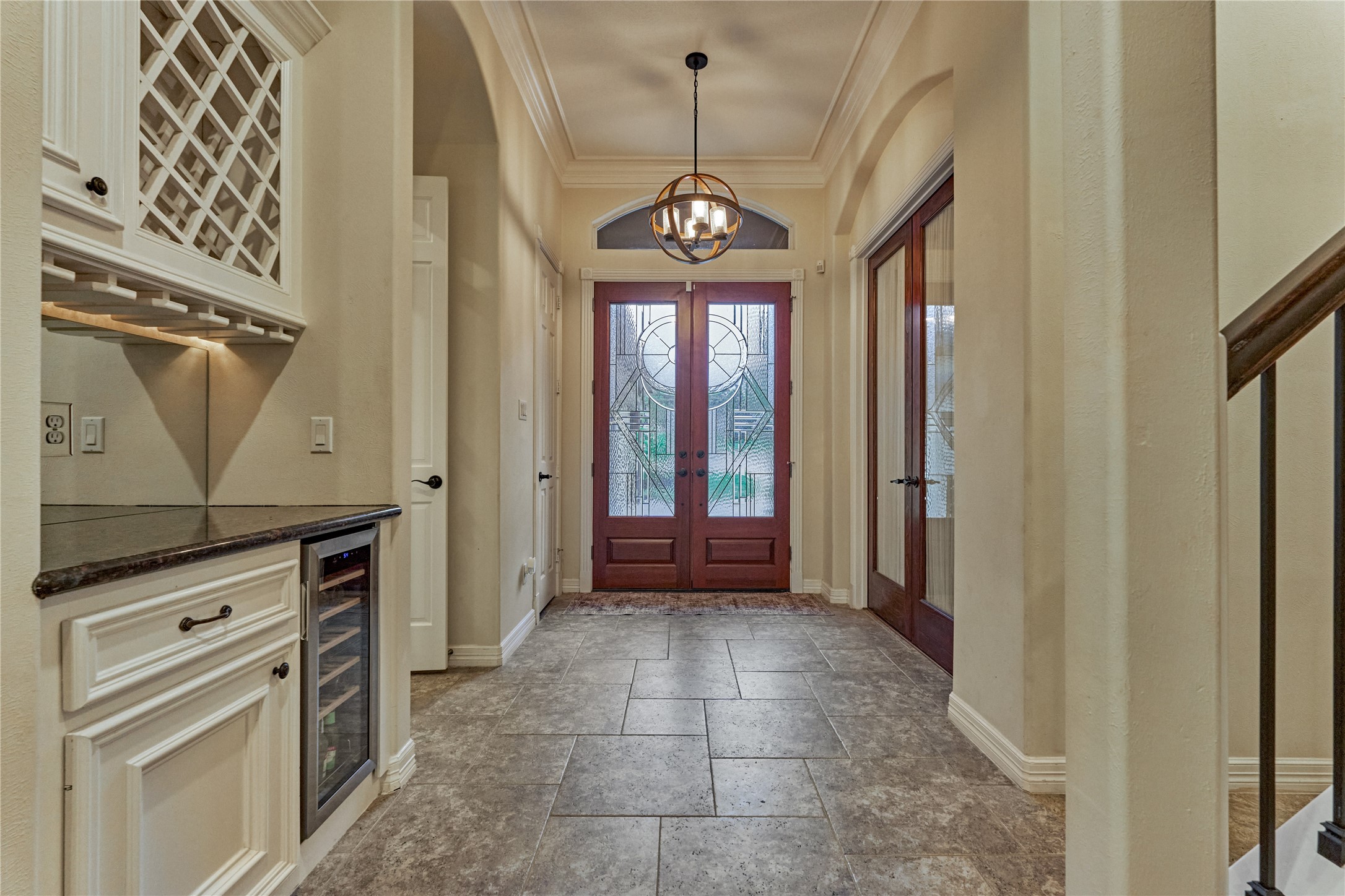 203 Monterrey Road East Montgomery, TX 77356 - Photo 8 of 50 A dry bar is conveniently placed off of the living room and near the kitchen. It houses a wine rack and a new wine fridge.