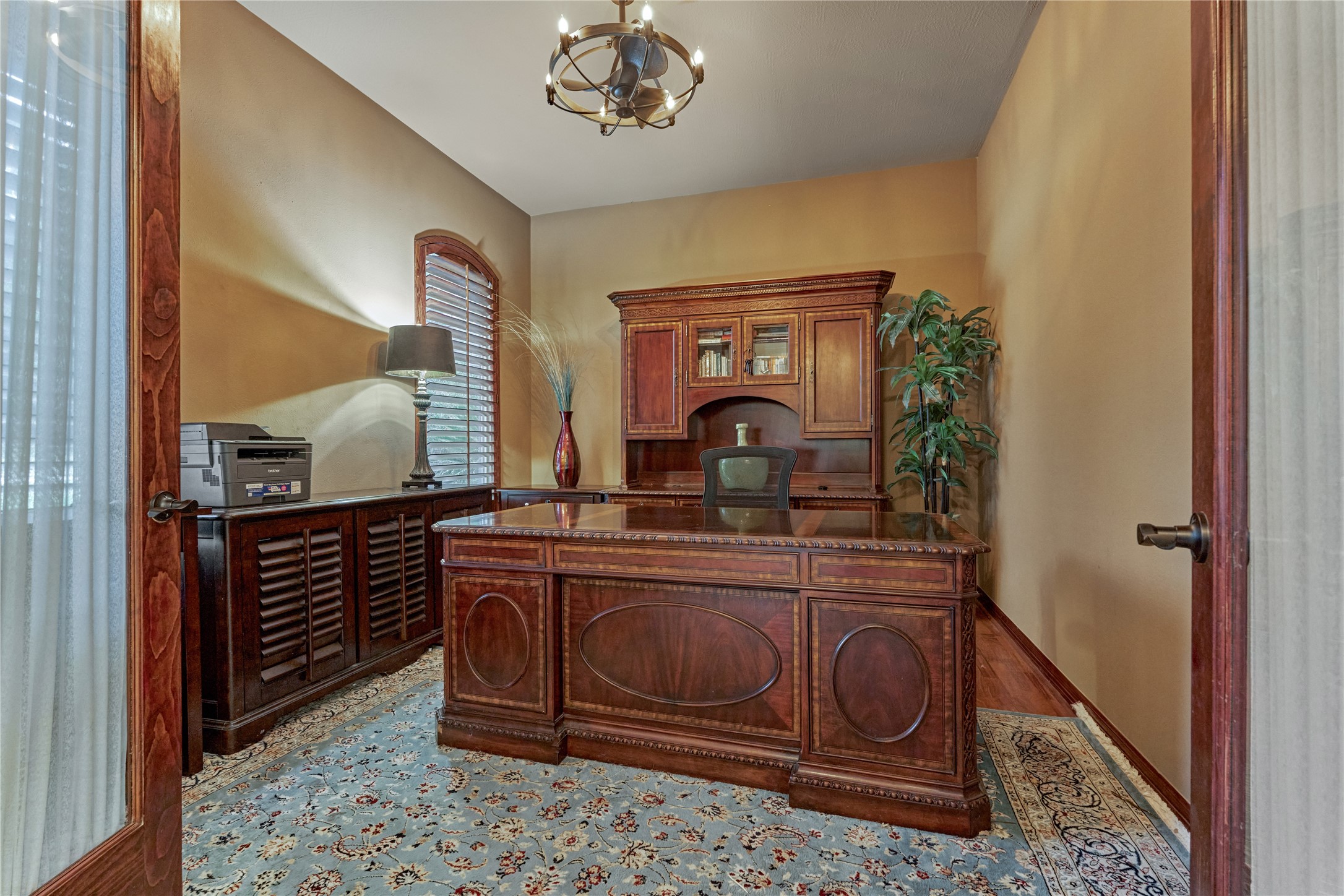 203 Monterrey Road East Montgomery, TX 77356 - Photo 9 of 50 Double French door entry into the study with plantation shutters to compliment all of the wood tones. This could be a 4th bedroom if desired.