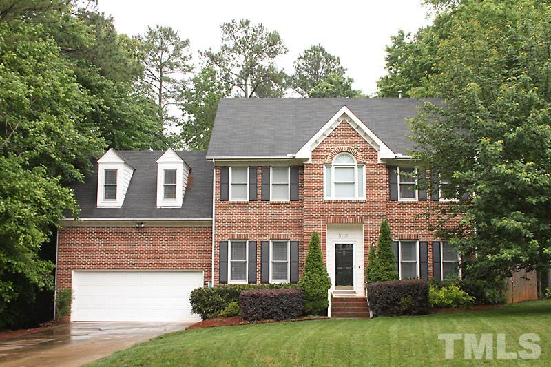 5116 Celbridge Place Raleigh, NC 27613 - Photo 1 of 15 a front view of a house with garden