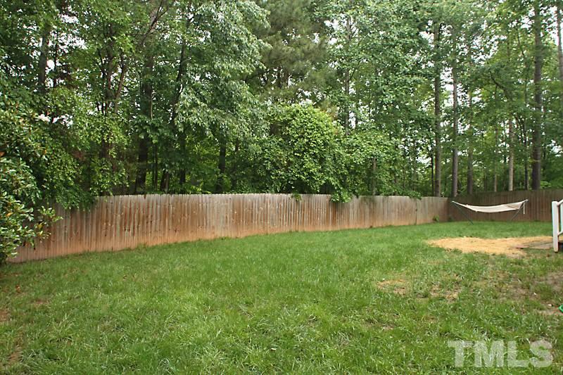 5116 Celbridge Place Raleigh, NC 27613 - Photo 14 of 15 a view of a back yard