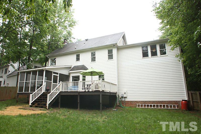 5116 Celbridge Place Raleigh, NC 27613 - Photo 15 of 15 a front view of a house with a yard