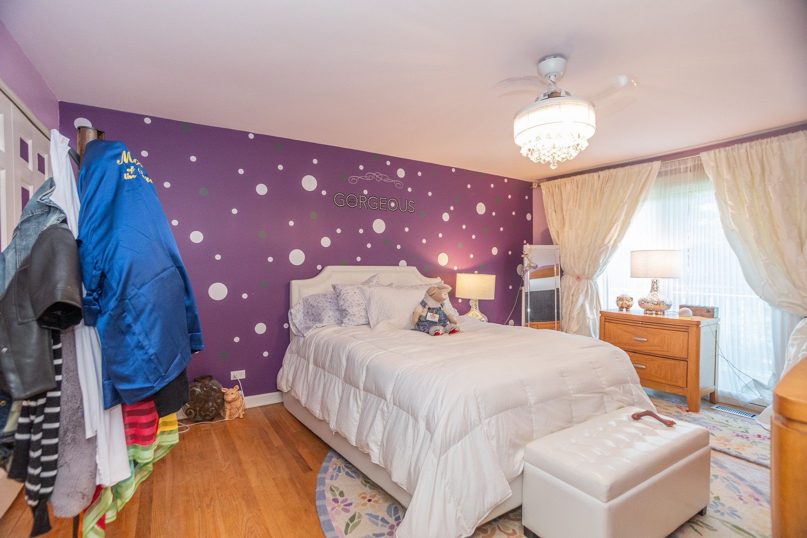 19-w078 Ave Normandy North Oak Brook, IL 60523 - Photo 12 of 15 a bedroom with a bed and a chandelier