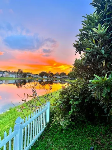 a view of a lake from a yard