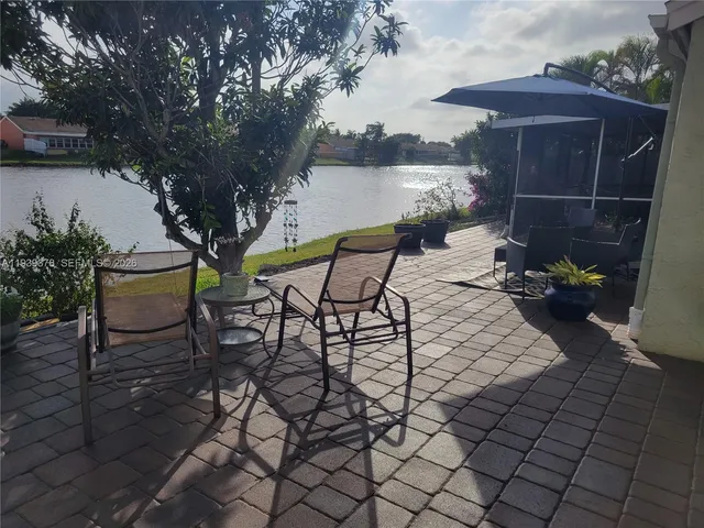 a view of a terrace with furniture