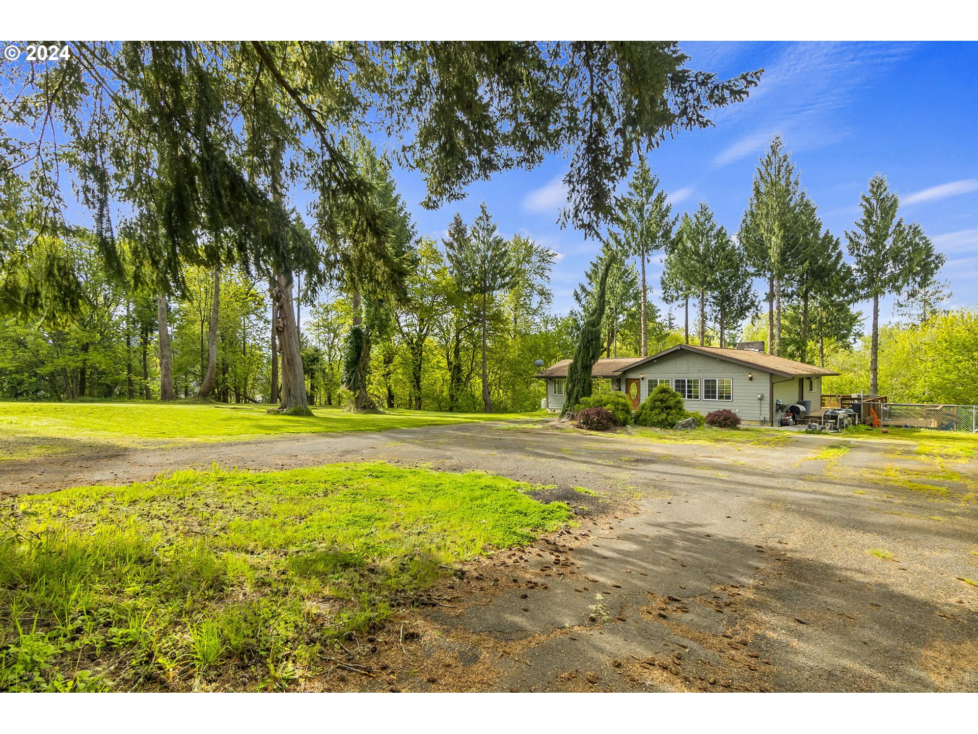 592 Nevil Road Winlock, WA 98596 - Photo 32 of 40 a view of a swimming pool with an outdoor space and seating area