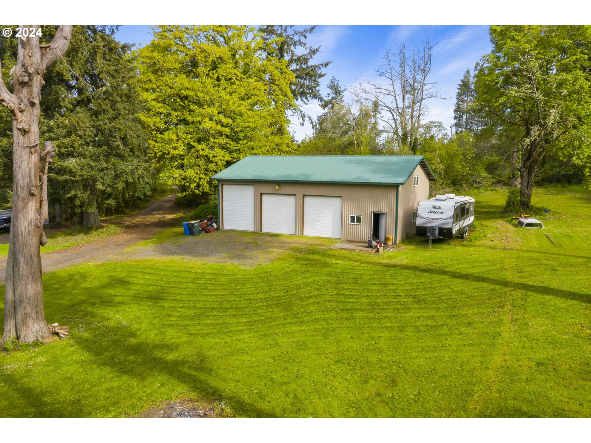 592 Nevil Road Winlock, WA 98596 - Photo 34 of 40 a front view of a house with a garden