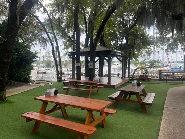 a view of a backyard with sitting area