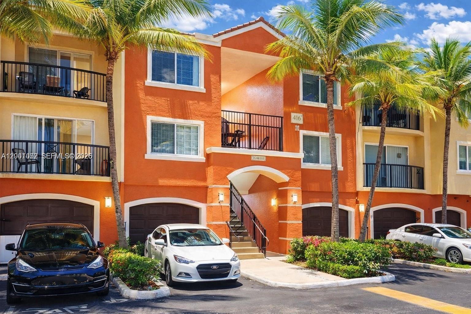 4167 Haverhill Road, Unit 1113 West Palm Beach, FL 33417 - Photo 1 of 19 a car parked in front of a building