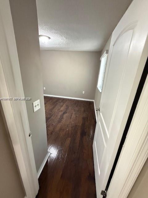 4167 Haverhill Road, Unit 1113 West Palm Beach, FL 33417 - Photo 16 of 19 view of empty room with wooden floor